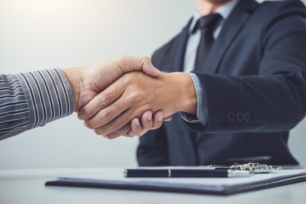 handshake of cooperation customer and salesman after agreement, handshake of cooperation customer and salesman after agreement,
